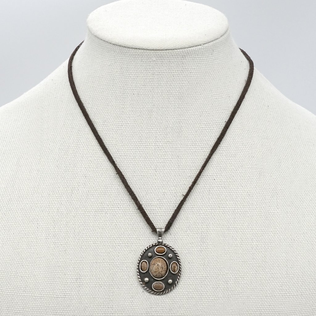 Necklace With Leather Cord And Silver Pendant.